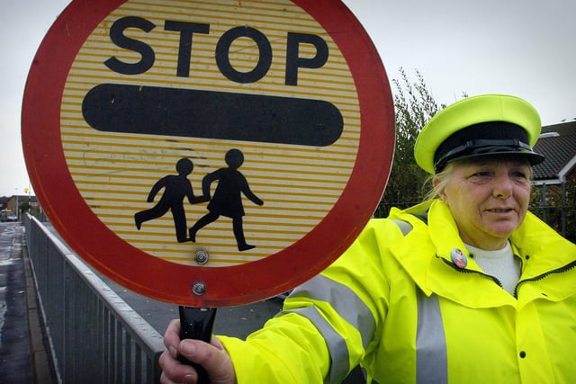Lollipop lady Sarah Foster, who worked outside Kincraig School in Bispham, 2005