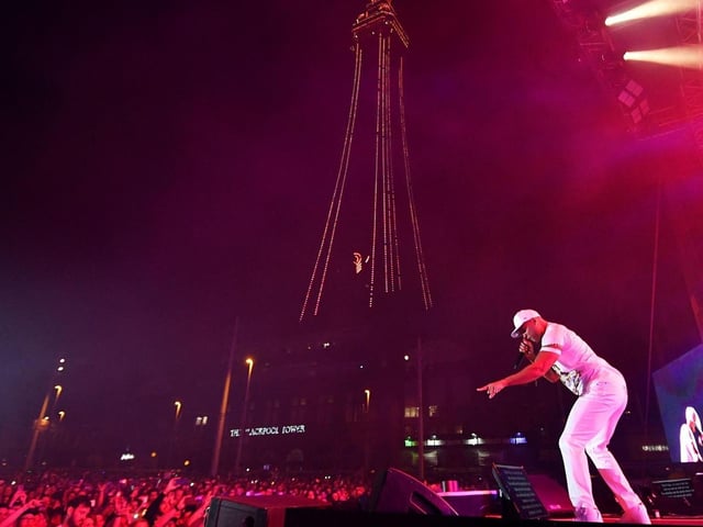 With our beautifully lit Tower in the distance - Will Smith is pictured on stage at the Livewire Festival in 2018