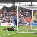 Gary Madine scored Blackpool's first goal from virtually on the goalline