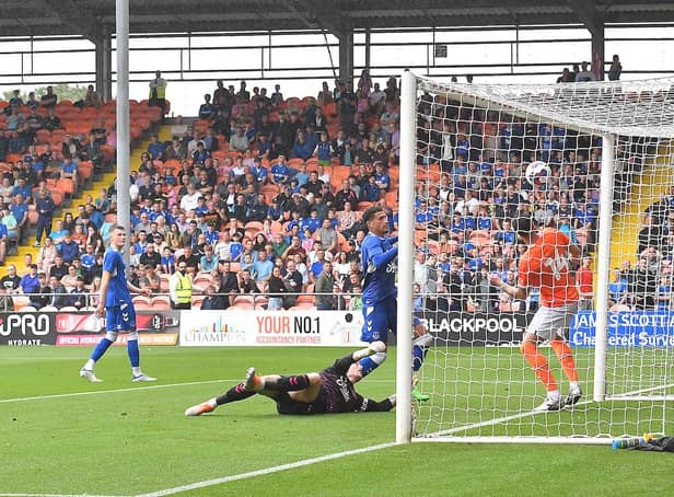 Gary Madine scored Blackpool's first goal from virtually on the goalline