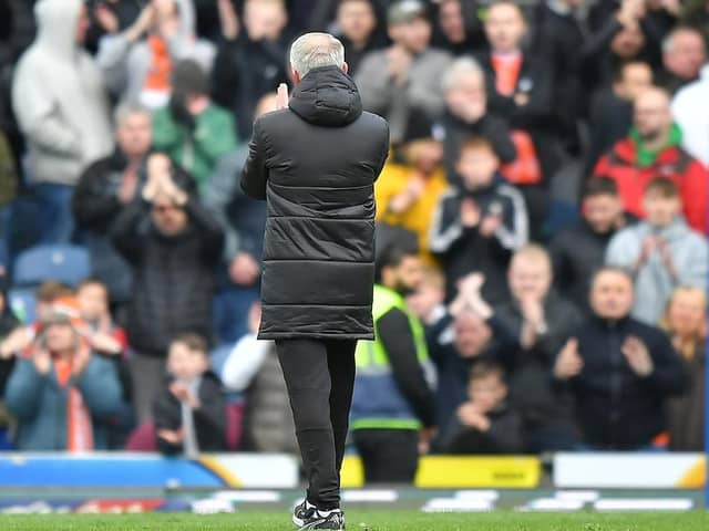 Neil Critchley applauds the travelling Blackpool fans after Saturday's draw at Ewood Park
