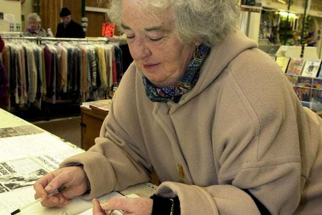 Shopper Kath Mulholland adds her name to the petition calling for the market to be saved back in 2000
