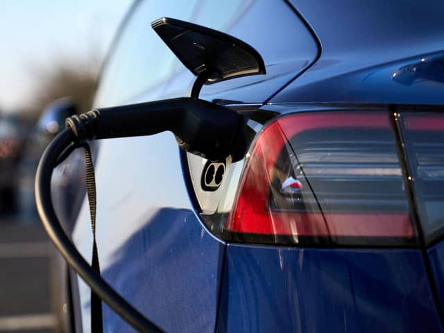 File photo dated 08/03/22 of an electric vehicle being charged. John Walton/PA Wire