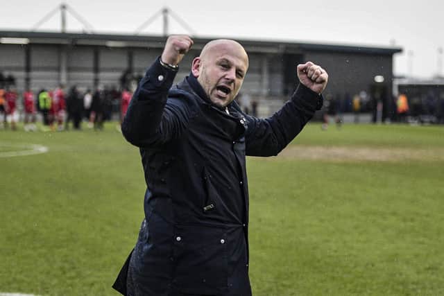 AFC Fylde boss Adam Murray celebrates the win over Darlington Picture: STEVE MCLELLAN