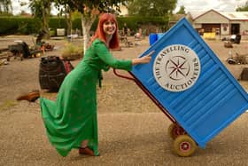 Izzy Balmer with the roll-in rostrum featured in The Travelling Auctioneers