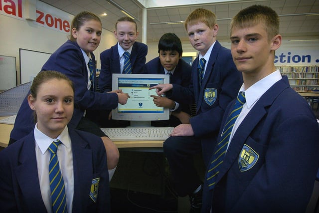 Pupils at Hodgson High School in Poulton took part in a  virtual vote as part of lessons and assemblies on the general election and democracy in 2005
Pictured voting online are L-R: Paris Leach, Kate Lloyd, Georgia Postlethwaite, Lloyd Douglas, Harry Almond and Tom Bowden