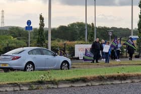 The first strikers outside The Harbour early this morning