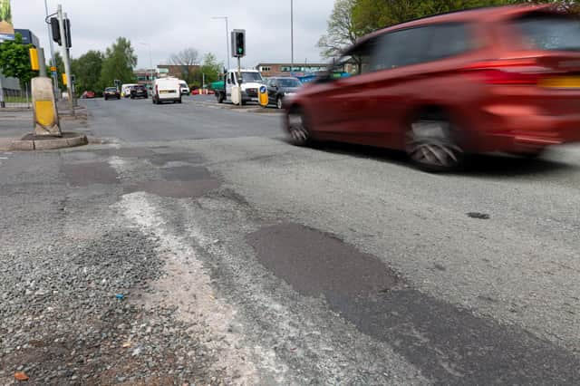 Lancashire County Council says it will invest £45m more over the next three years to reduce the number of roads that look like this