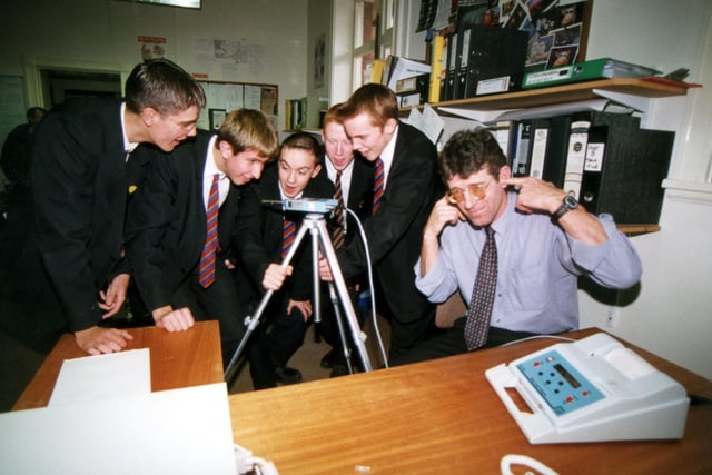 Team Leader Dave Bulshaw from pollution control with pupils Greg Tirrell, Chris Bowley, Jonathan Montgomery, Paul Nutter and Sean Walsh testing out a noise metre in 2000