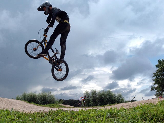 Making quarter pipes at Lawsons field for our BMX use. Getting chased by the parkies at Stanley Park on our BMXs. Not a mobile in sight - Craig Sagar.
This photo shows a BMX biker at Stanley Park