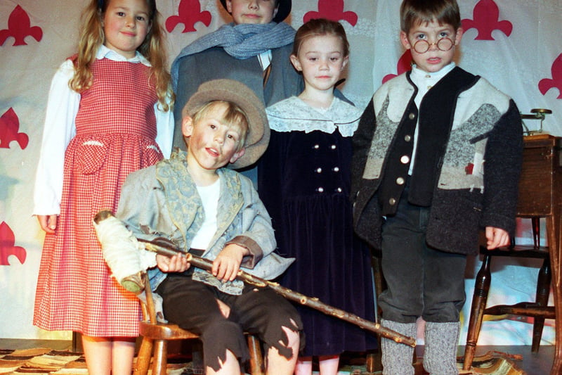King Edward Infants Christmas Play, 1996 - Tom Thumb. Liam Carr (Tom Thumb). Back: Ellie Rostron-Jones, Toby Weighman, Adrienne Hewitt and Harry Syms (Scrooge)