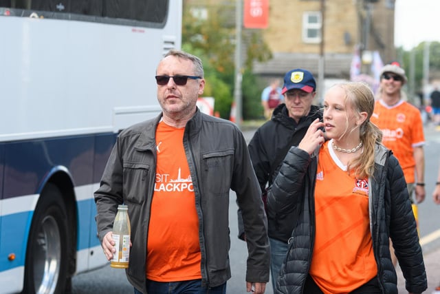 Blackpool fans arrive at Turf Moor ahead of the fixture with Burnley. Photo: Kelvin Stuttard