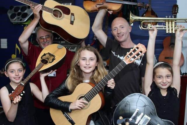 Co-founder John Shaw with students at Blackpool Music School