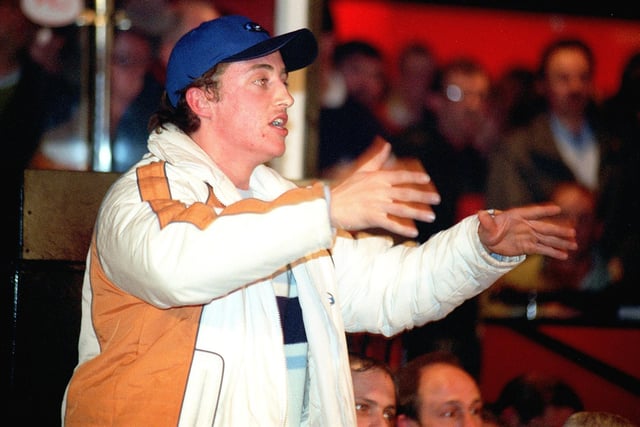 Blackpool FC held a meeting in the Tangerine Club where fans could ask questions about the new stadium and the future of the club, back in 1998
The photo shows one fan voicing his concerns