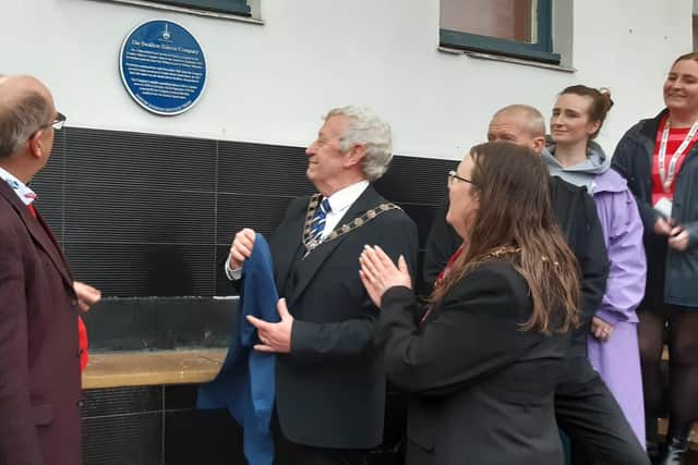 The unveiling of the plaque