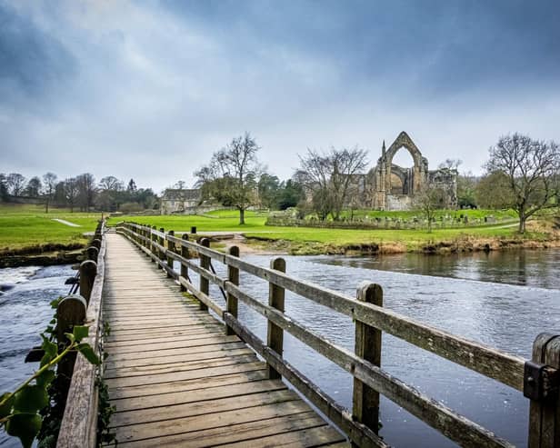Bolton Abbey and the footbridge over the River Wharfe in the Yorkshire Dales National Park. PIC: Tony Johnson