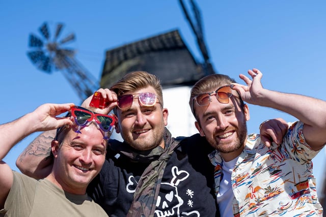 More fans gather on Lytham Green, with the town's landmark windmill in the background