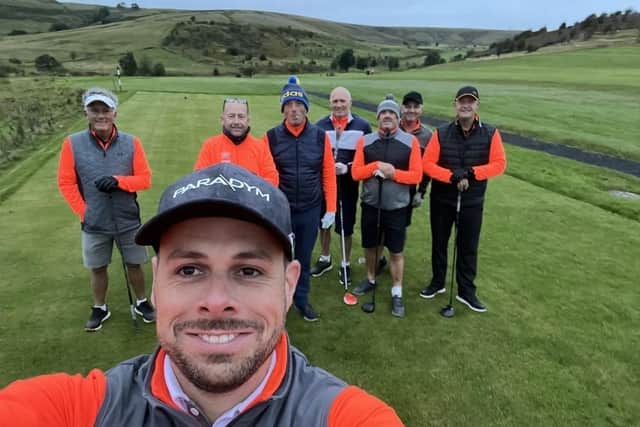 Chris Latham (front) and other golfers raising money for youngster Mabel Gregson