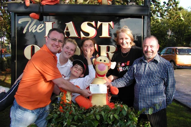 The Last Orders pub in Thornton has handed the money it won in the Fleetwood Weekly News Pub of the Year competition to Blackpool Tiggers Club, 2006