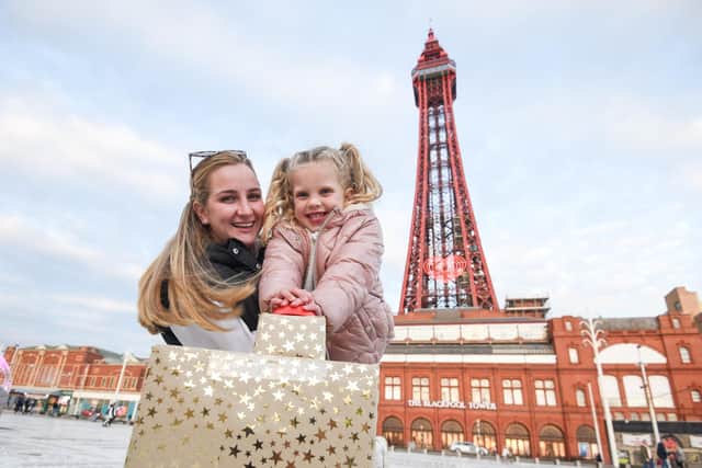 Alba Butler, with mum Alejandra, switches on Blackpool Tower lights to mark World Heart Day