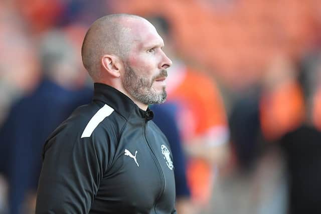 Michael Appleton will be looking for a reaction when his side host Swansea City on Saturday