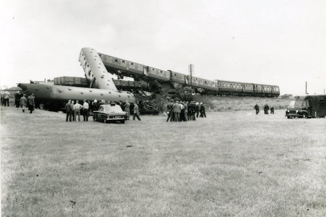The caption on the back of this picture reads, crash between a diesel boat train travelling from Colne to Fleetwood and a stationary ballast train near Weeton , July 16 1961