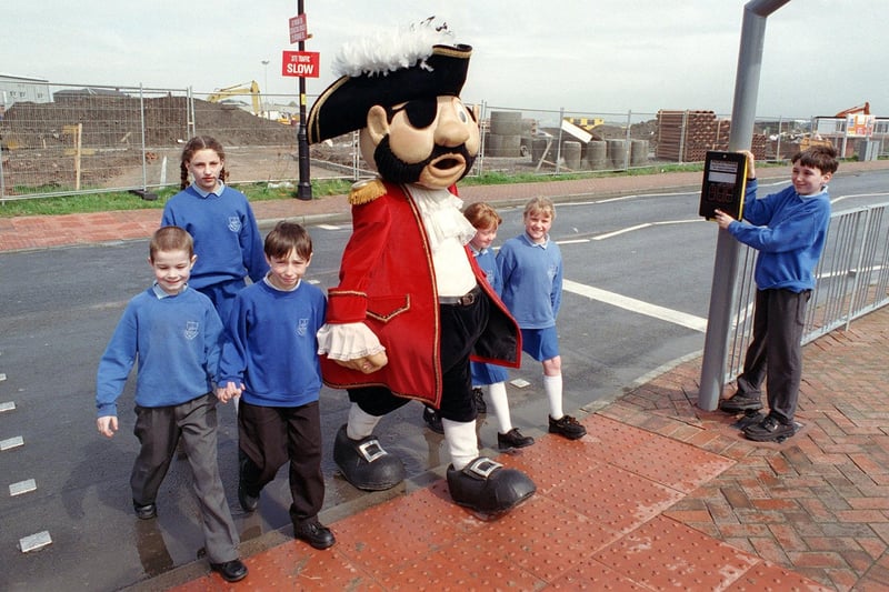 Children from St Mary's RC Primary School, Fleetwood and  "Captain Freeport" try out the new pelican crossing on Anchorage Road, Fleetwood. Chris Perkin (right) is pictured wit h Helena Sievers, Jack Burman, Peter Scott, Katherine Lamb and Samantha Wheeldon.