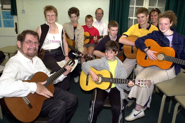 Stu Wright and his wife Rusty (left of picture) from FOLKUS, with some of their pupils enjoying a day of music in 2001