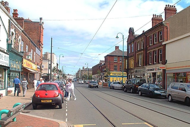 This photo was taken in 2003. Not much has changed, except the trees have grown. Iceland to the right and Stationary 4 Less with Warburton's Chemist on the left. The photo was taken when the town centre had undergone a make-over with new pavements, street furniture and the planting of trees. The next big development was Asda