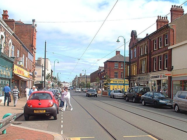 This photo was taken in 2003. Not much has changed, except the trees have grown. Iceland to the right and Stationary 4 Less with Warburton's Chemist on the left. The photo was taken when the town centre had undergone a make-over with new pavements, street furniture and the planting of trees. The next big development was Asda