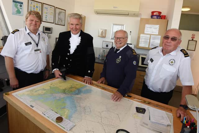 The High Sheriff of Lancashire Martin Ainscough with National Coastwatch Institution volunteers.  From left, Paul Midgley, the High Sheriff of Lancashire Martin Ainscough, station manager Martyn Cripps and Alan Knowler.