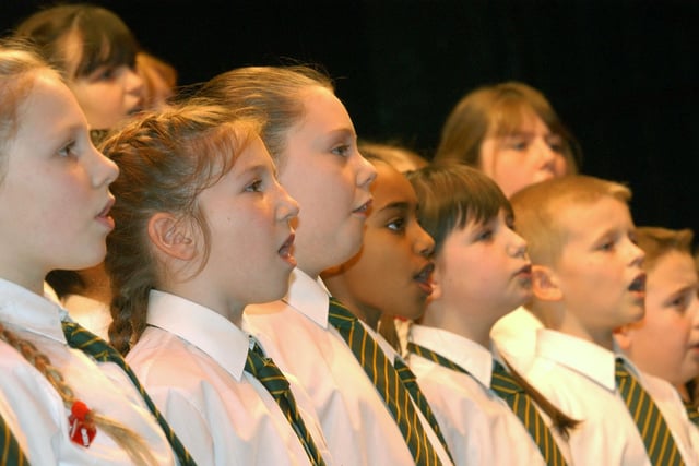The grand final of City Sings in 2004 and students from Hill View Junior School were pictured during rehearsals.