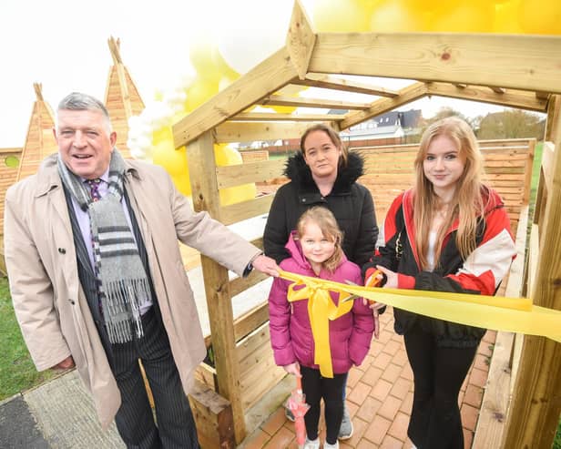 Opening of new play area at Larkholme Primary School in memory of Lucy Willacy-Brown. Pictured are former headteacher David Fann with Nikki Willacy and Alesha and Katie Willacy.