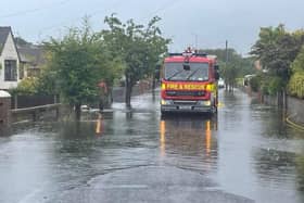 Fire engines attend flooding on Calder Avenue in Thornton