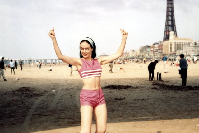 Barbara Mayerling (nee Turner), daughter of Blackpool trader Jesse Turner poses on the beach