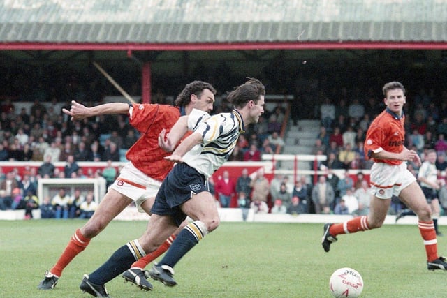 Garry Briggs joined Blackpool in 1989. He is pictured here with Tony Ellis chasing the ball in a Preston North End clash, 1992