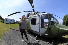 Katie Lewin at Ream Hills Holiday Park and the helicopter - one of the most unusual places to sleep in Lancashire