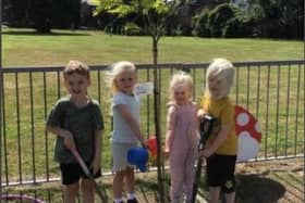 Pupils of Ormskirk Church of England Primary School after the planting of the tree.