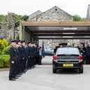Firefighters perform a guard of honour for former BBC TV presenter and firefighter Beccy Barr at Beetham Crematorium. Photo: Kelvin Lister-Stuttard