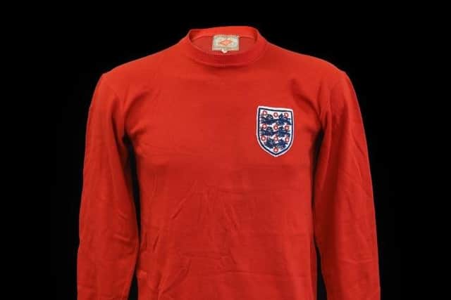 Alan Ball's famous red England shirt, worn in the final of the 1966 World Cup, is up for auction