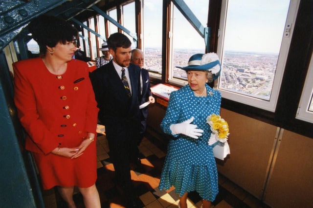 The Queen took in the views of the Fylde Coast when she went up Blackpool Tower during her visit in 1994. She is seen here with Katherine O'Connor of First Leisure and Tower general manager Steve Brailey.