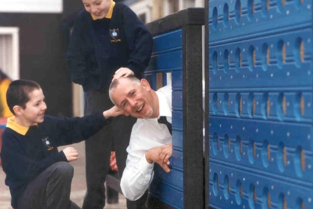 Staff and pupils at Baines Endowed CE Primary School in Blackpool were trying out new, refreshing playground facilities for the children to play with and enjoy in 2003.
Picture shows brothers James and Thomas Willan trying out the activity panel with Jim Morrison from Springfields