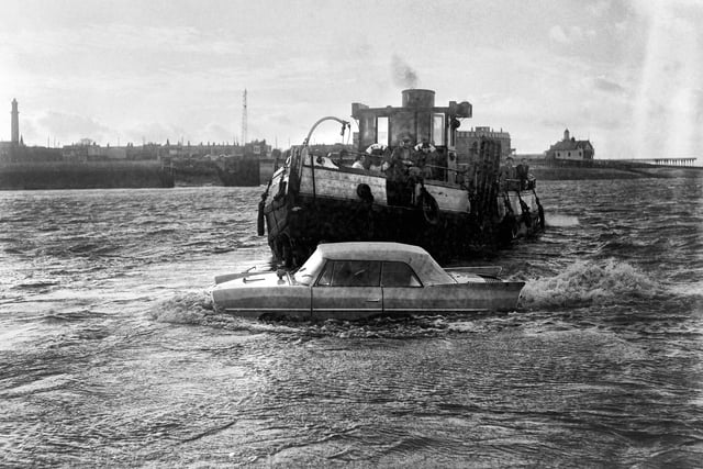 American designed, combined car and boat, the Amphicar, in it's first North of England sea trials off Knott End in 1964