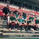 Foxhall Under-14s celebrate their Coulton Cup triumph at Fleetwood Town