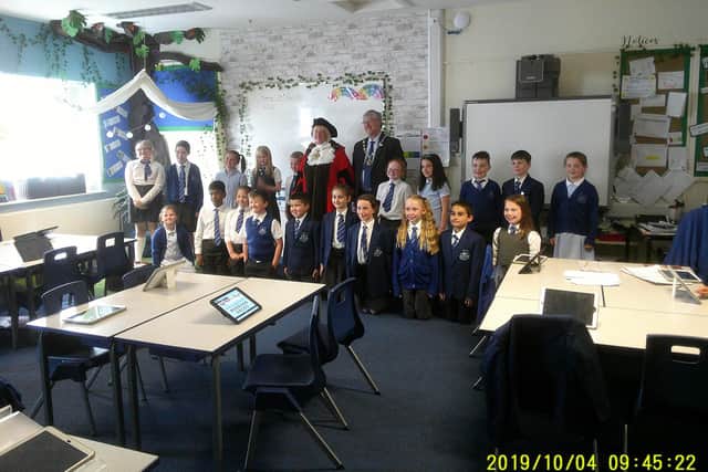 Mayor of Wyre, Coun Andrea Kay, and consort Coun Phil Orme, in a classroom at St Mary's RC Primary School