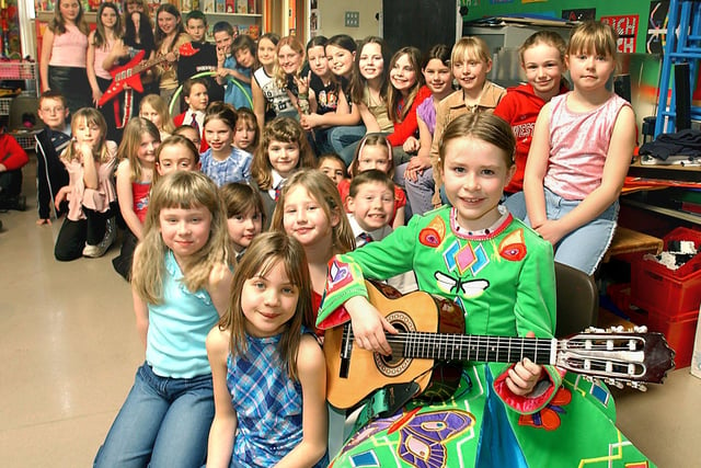 Clifton County Primary School children's talent show. Eight year old Niamh Boadle (with guitar) and fellow performers