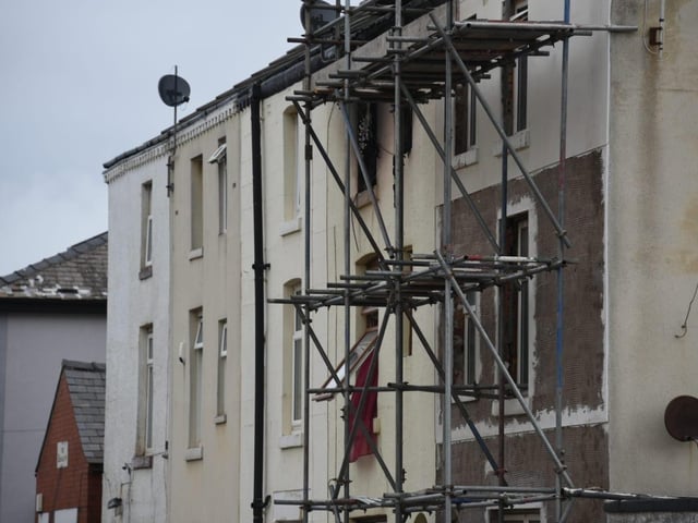 Neighbours said they were woken by "screams and loud banging" before they were evacuated from their homes.