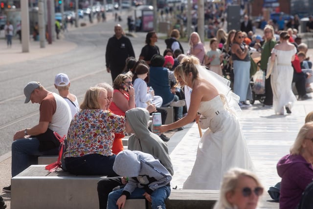 Who can resist a bride? Members of the public were generous in their donations for a good cause