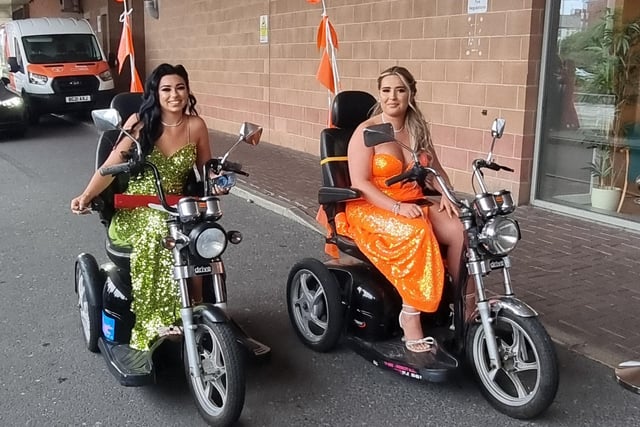 Leoni Alden and Aaliyah Howard arrive on scooters