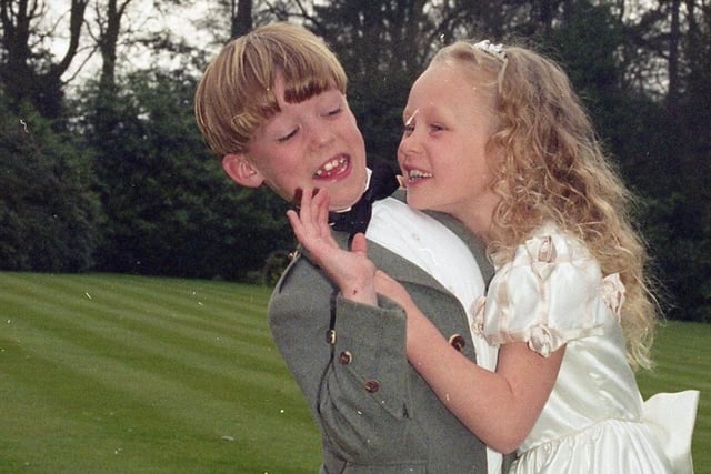 Scores of brides-to-be packed out Preston's Marriot Hotel for their popular annual wedding fayre. Pictured: Keaton Dickinson, eight, and his sister Lucinda, seven, of Lytham, modelling wedding clothes for the fayre